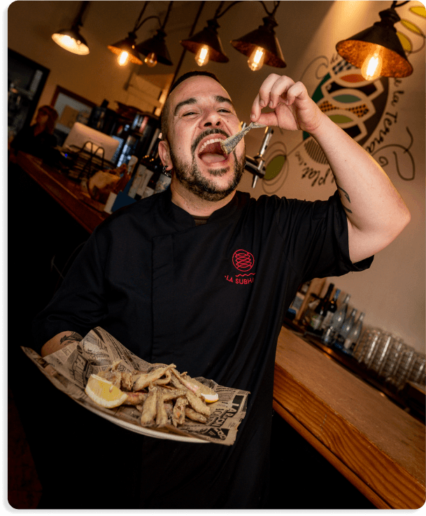 chef eating delicious plate